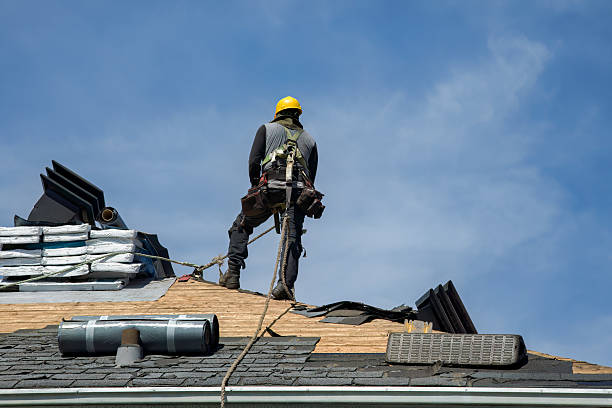 Professional Storm Damage Roof Repair technician working in Arkansas City, KS